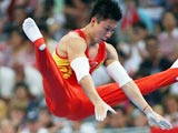 40金：李小鹏双杠夺冠[组图]